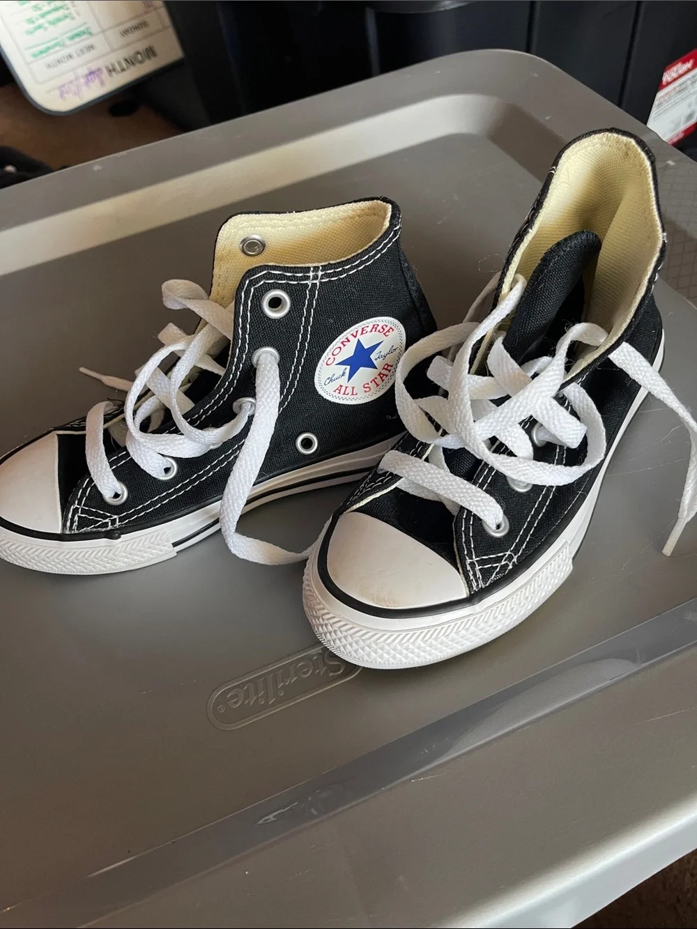 Kids 11 Converse Black and White High-Top Sneakers